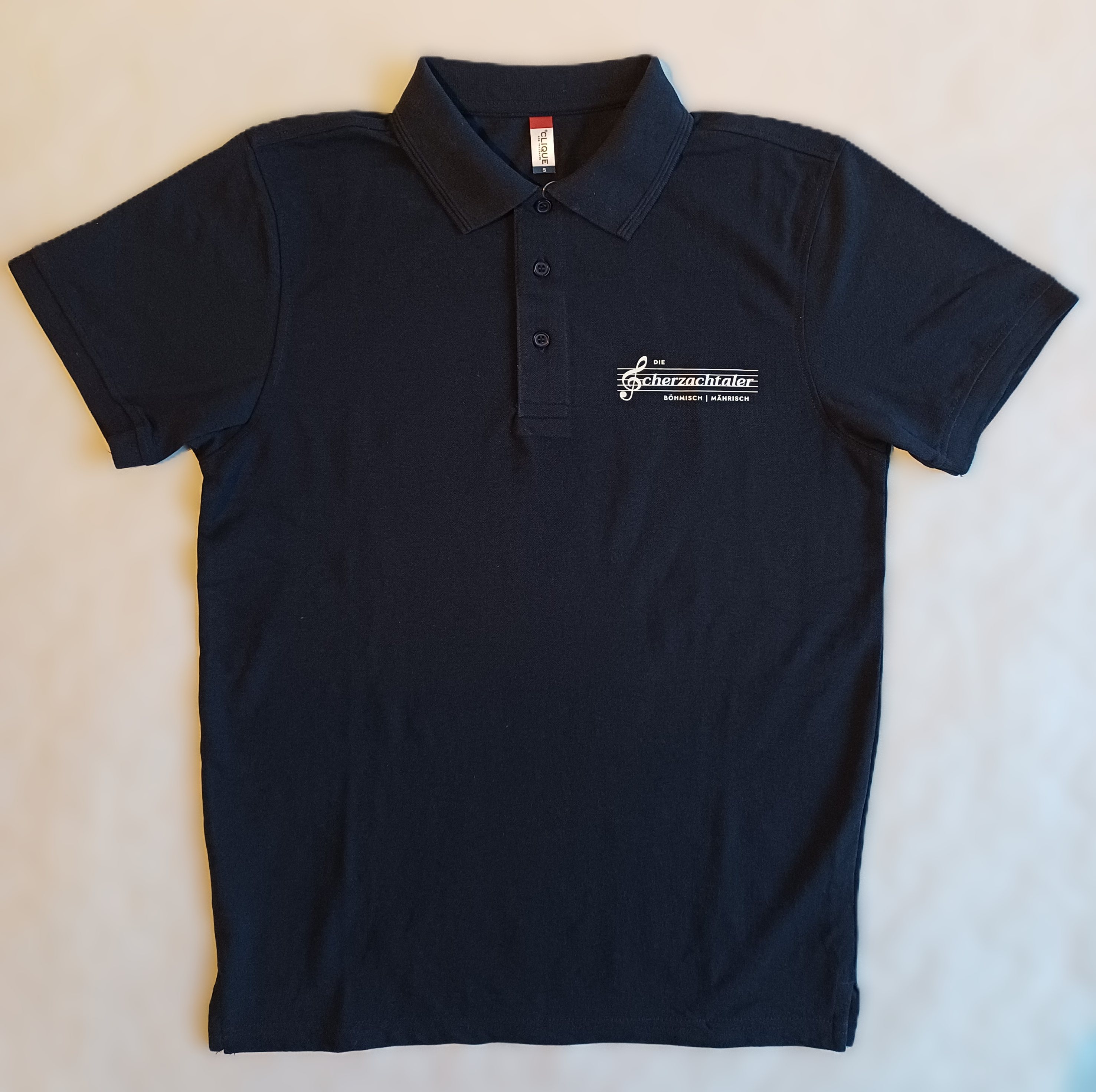 Poloshirt mit Logo "Die Scherzachtaler" und Rückendruck, Manhattan Dunkelblau